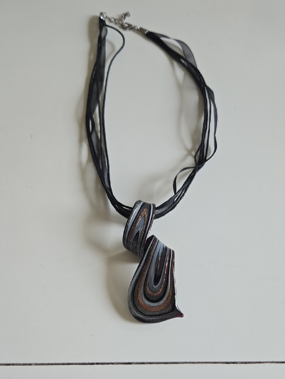 Handcrafted Black and Metallic Swirl Pendant Necklace